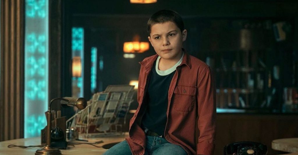A shot of Stanley (Javon Walton) sitting on a reception desk from The Umbrella Academy Season 3