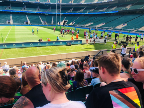 People watching rugby
