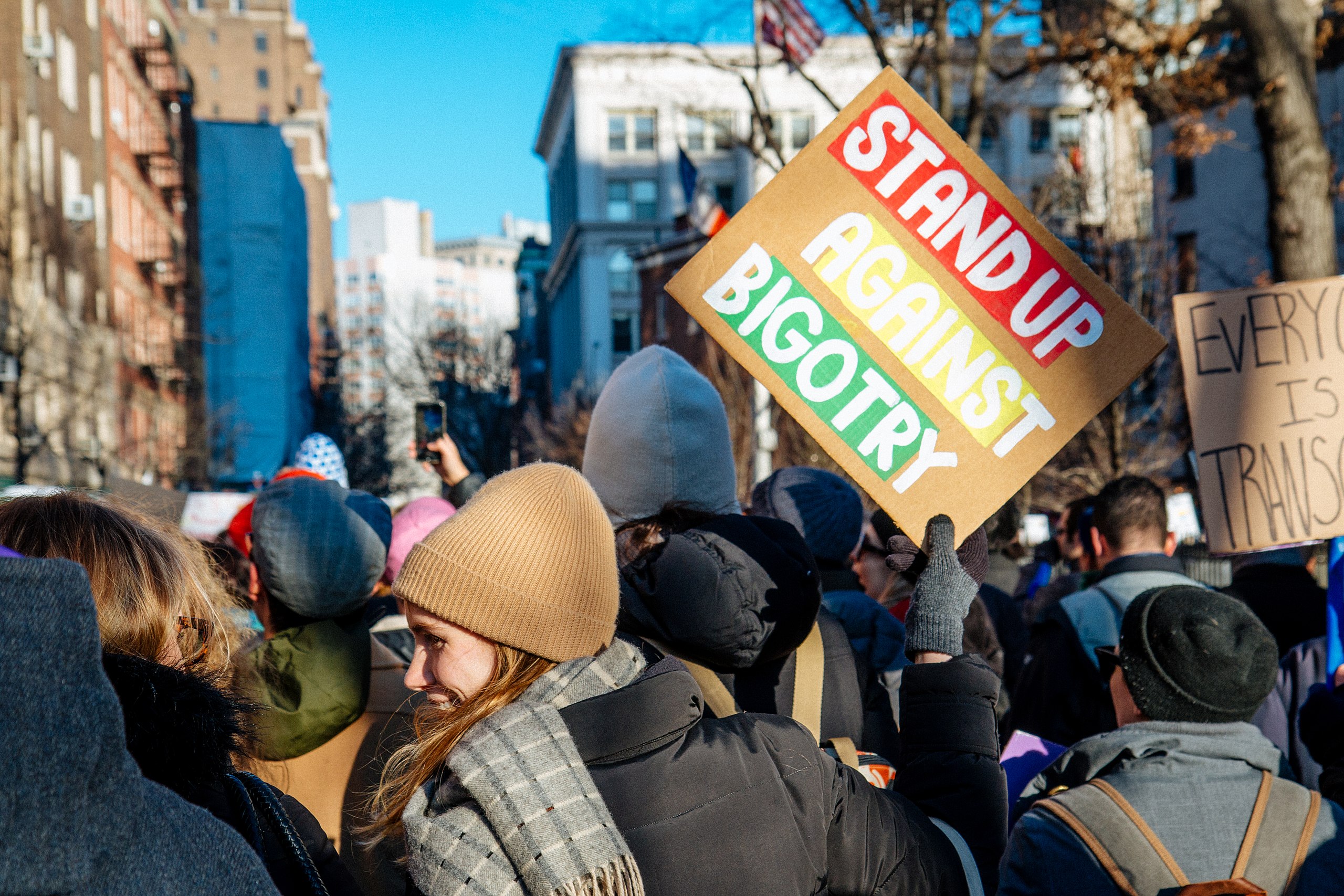 Image for failed allyship article that shows the protest for LGBT solidarity with all those affected under Donald Trump's policies. The photo shows...