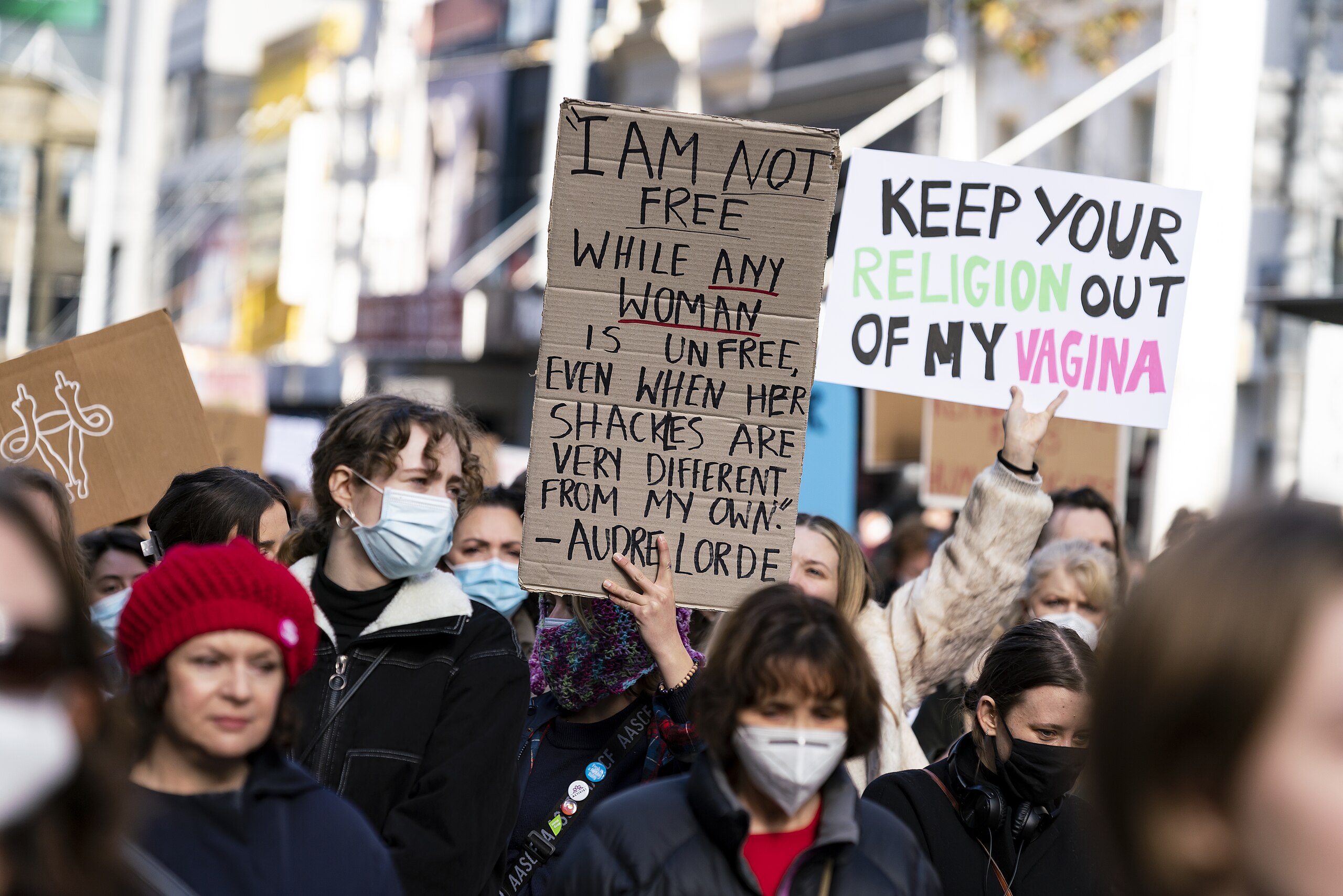 Not the greatest assault on women in JK Rowling's life; a photo of a protest in support of Roe Vs Wade showing signs reading "Keep your religion ou...