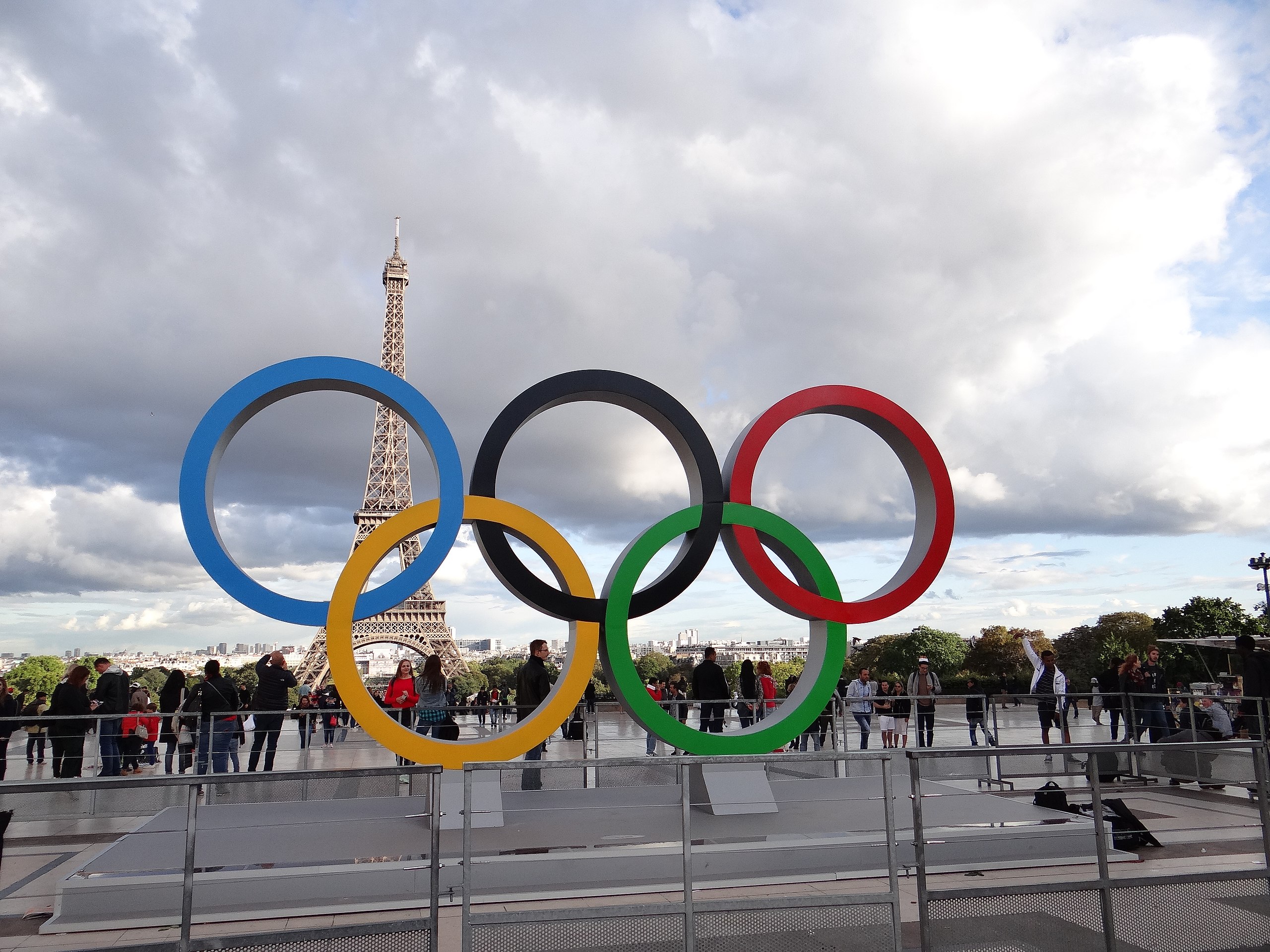 The Olympic Rings in Paris near the Eiffel Tower. Imane Khelif is a cisgender woman who is competing at the Paris 2024 Oylmpics.