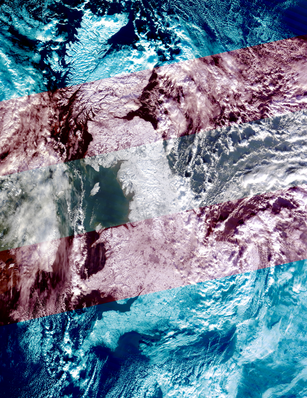A satellite photo of the UK under snow that I have layered a trans flag over the top of. Trans Britain. That's what we are now. Woo.