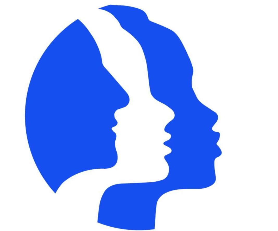 The New Women's March logo; three silhouettes of faces overlayed on top of each other and alternating in colours from blue to white and back to blue again. They are meant to represent a diverse selection of women and include different facial features.