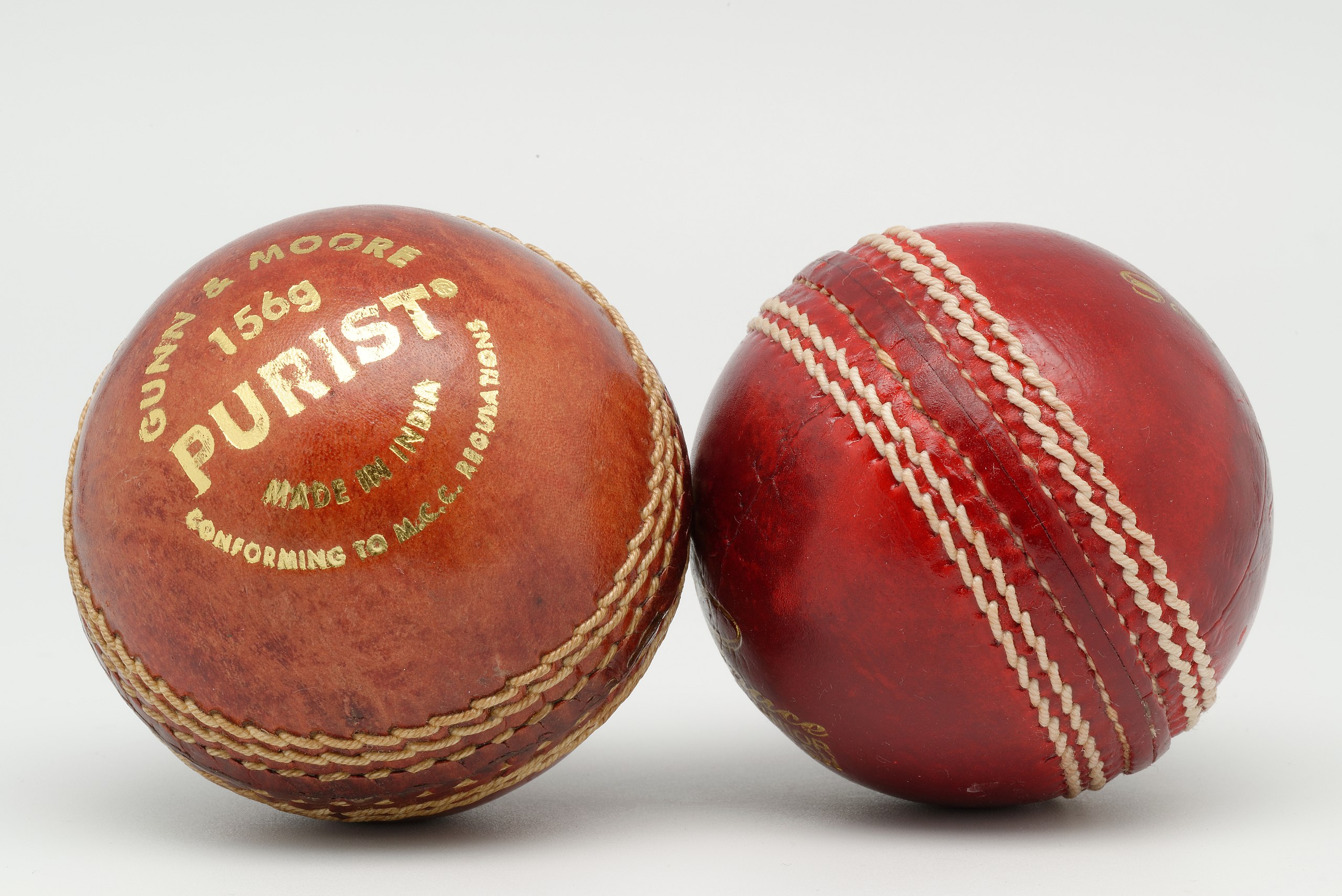 Two cricket balls to illustrate the question 