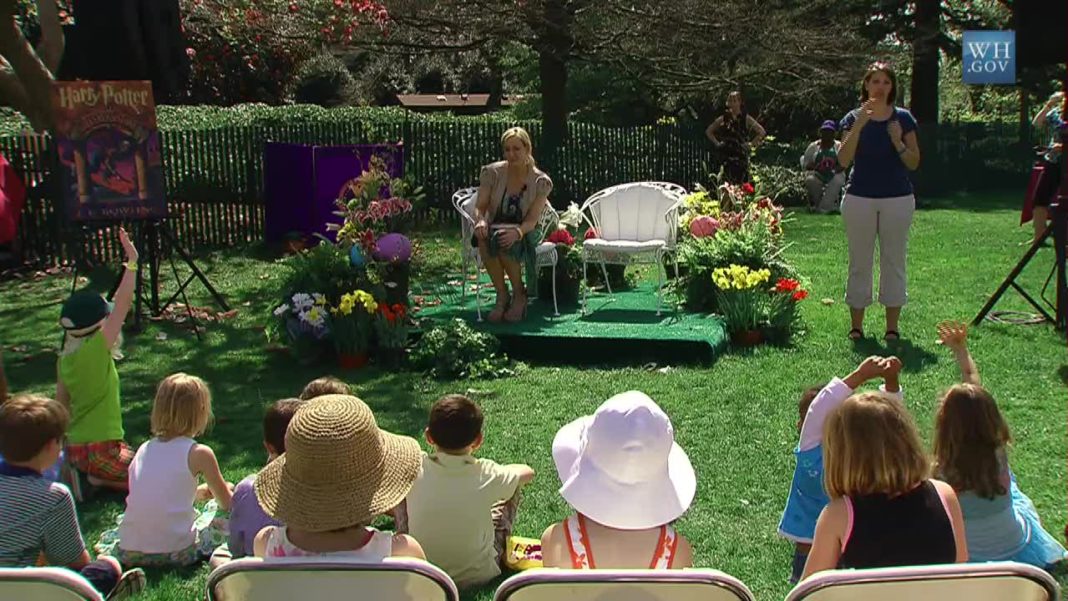 JK Rowling's wacky weekend; an image of JK Rowling reading her book to children at the White House in 2010