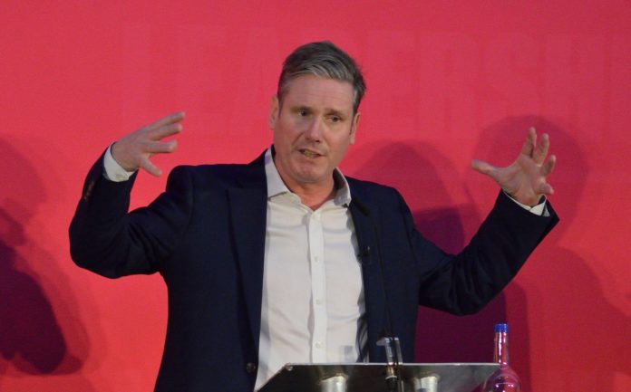A photo of Keir Starmer giving a speech at a Labour conference where UK Labour is outright lying, probably.. Photo by Rwendland, Wikimedia Commons