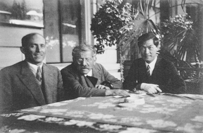 From left to right the photo is an early 1900s snap of Bernhard Schapiro, Magnus Hirschfeld and Tao Lee. ie the men at the center of why people are accusing JK Rowling of Holocaust denial