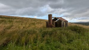 A small dilapidated building on the border between England and Scotland